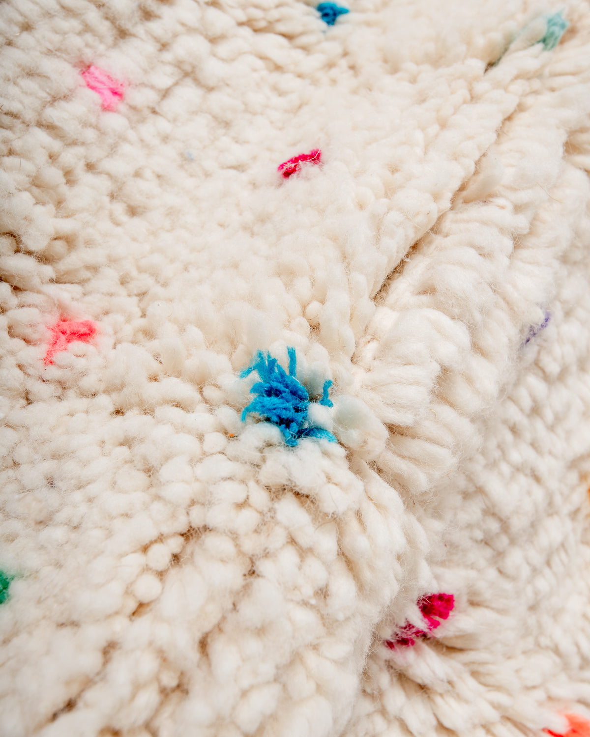 Modern, designer, handcrafted Berber rug from Morocco. Beniourain carpet with beautiful colours and patterns and fluffy wool texture.